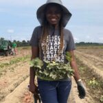 Modesta Abugu in a Sweetpotato field in Clinton, NC. Photo credit: Simon Fraher, NC State University.
