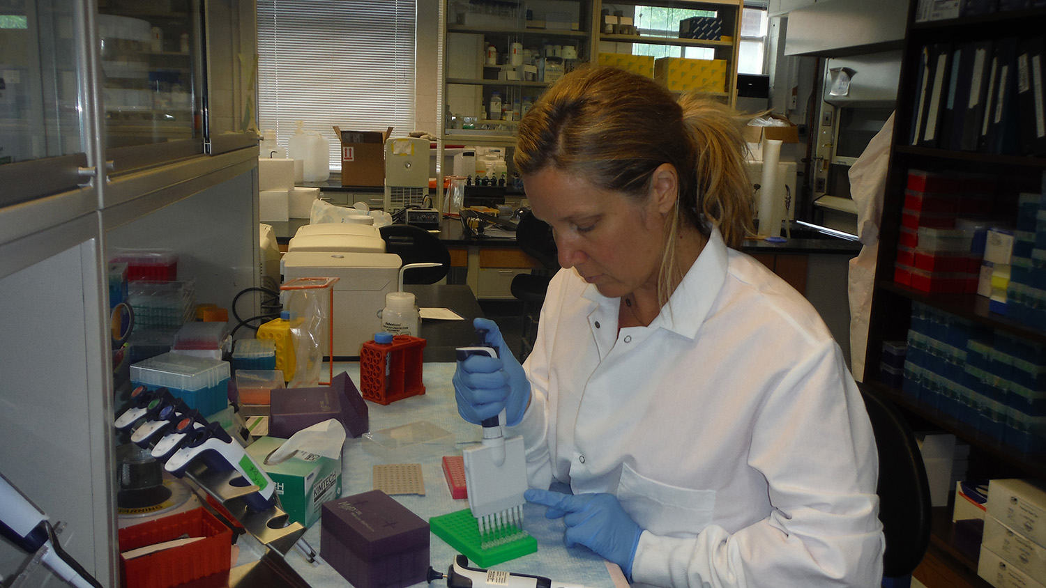 Photo of researcher in the lab.