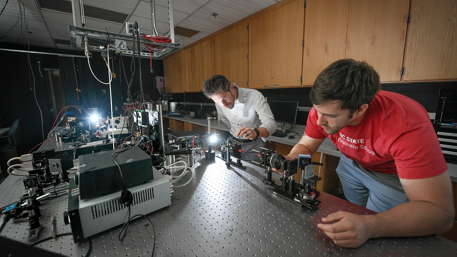 Dr. Michael Kudenov and graduate student work in Optical Sensing Lab.