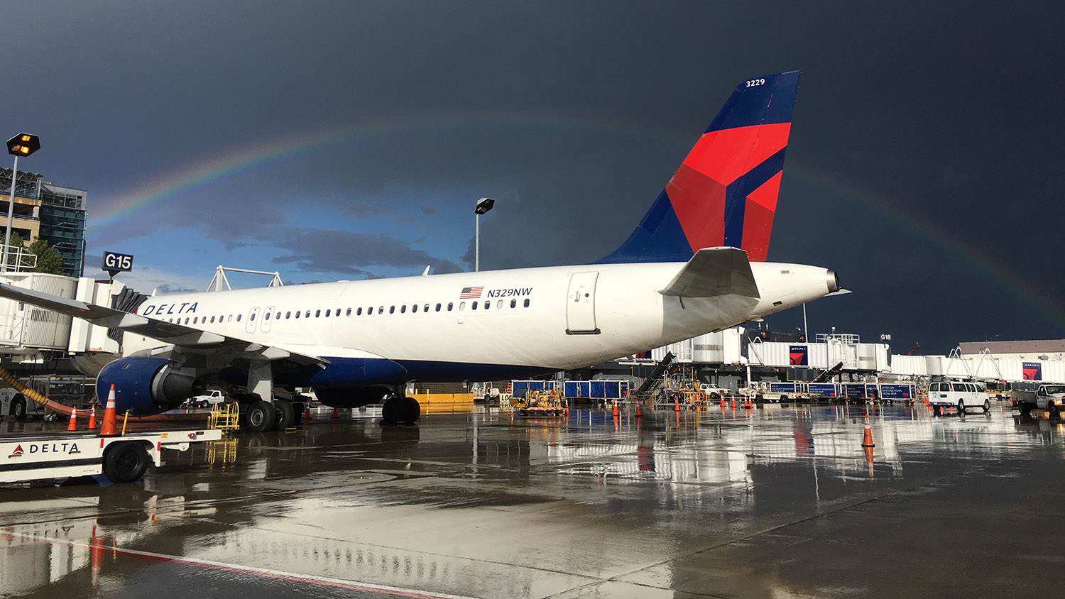 rainbow over Delta airplane