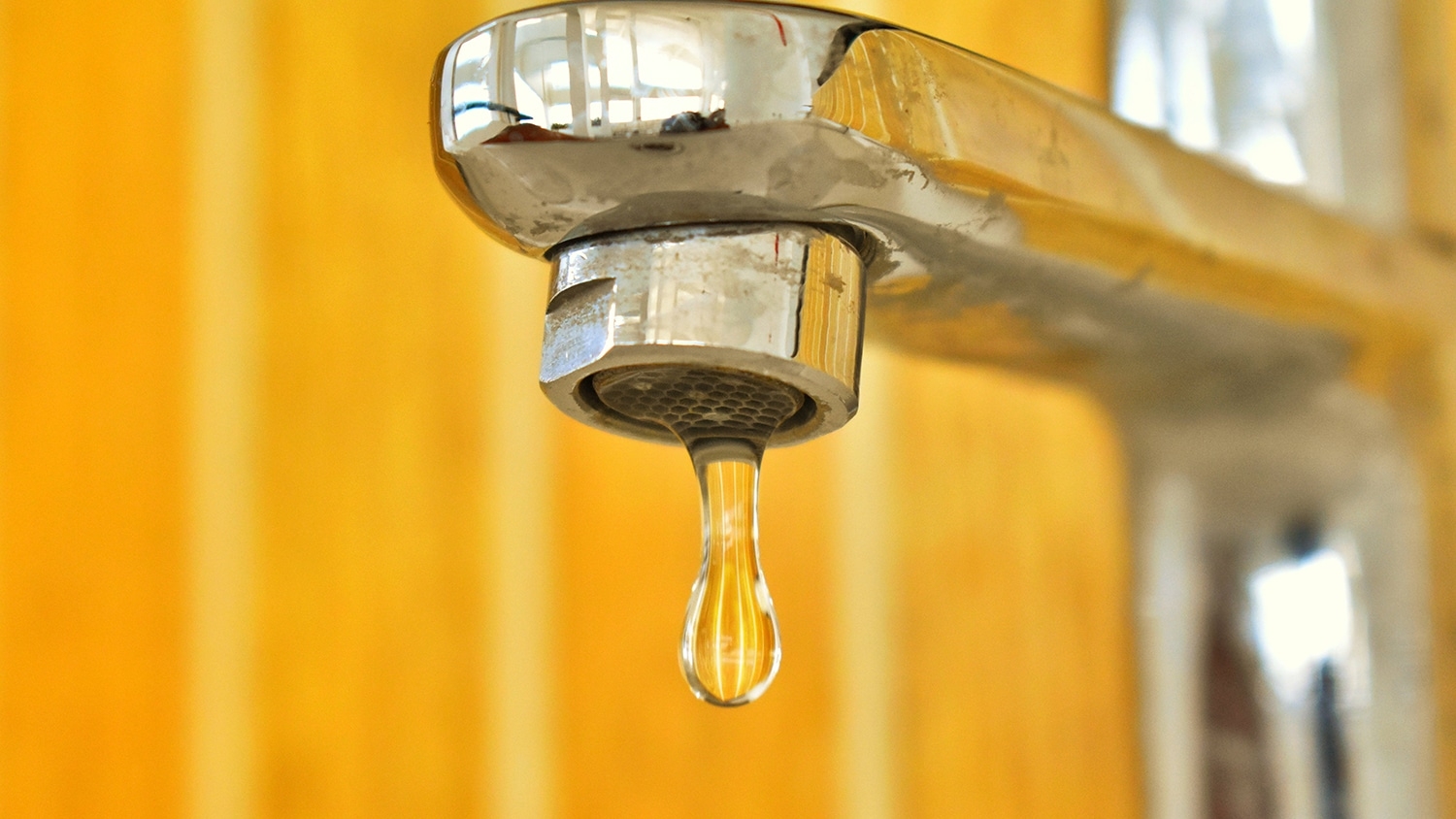 water drips from faucet