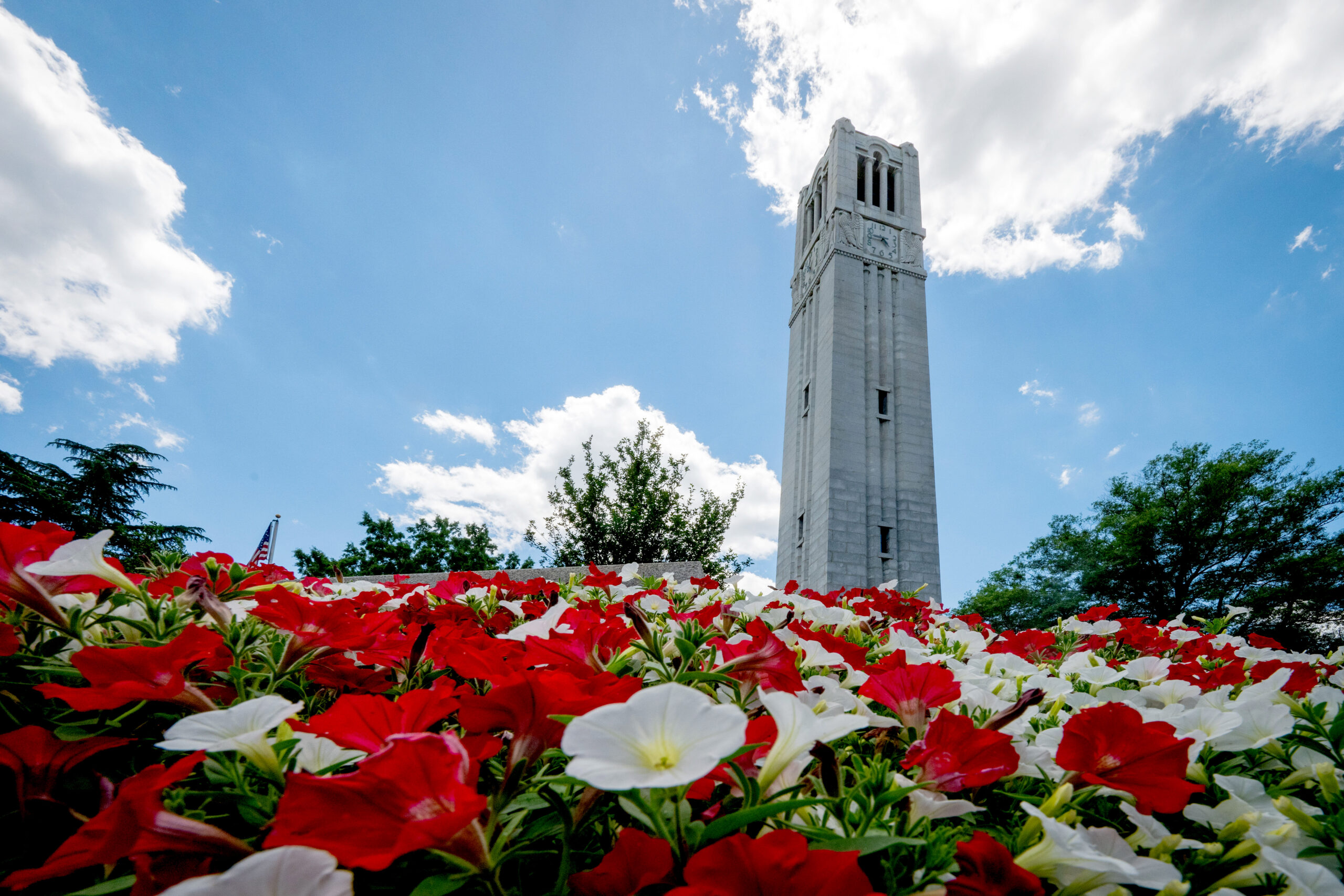 The Belltower is framed with spring flowers on a warm May afternoon. Photo by Becky Kirkland.