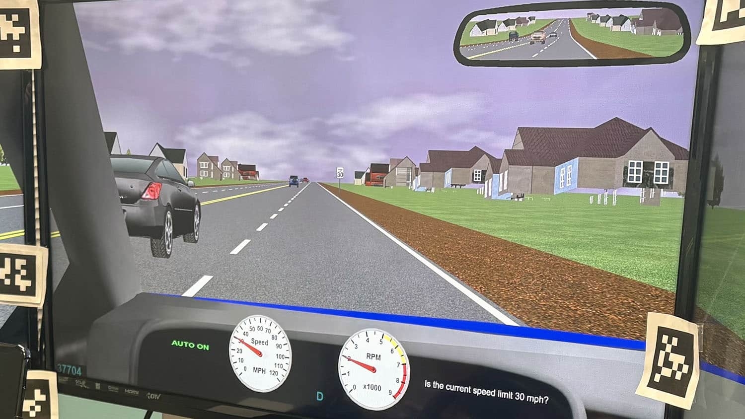 driving simulator shows text prompt on display